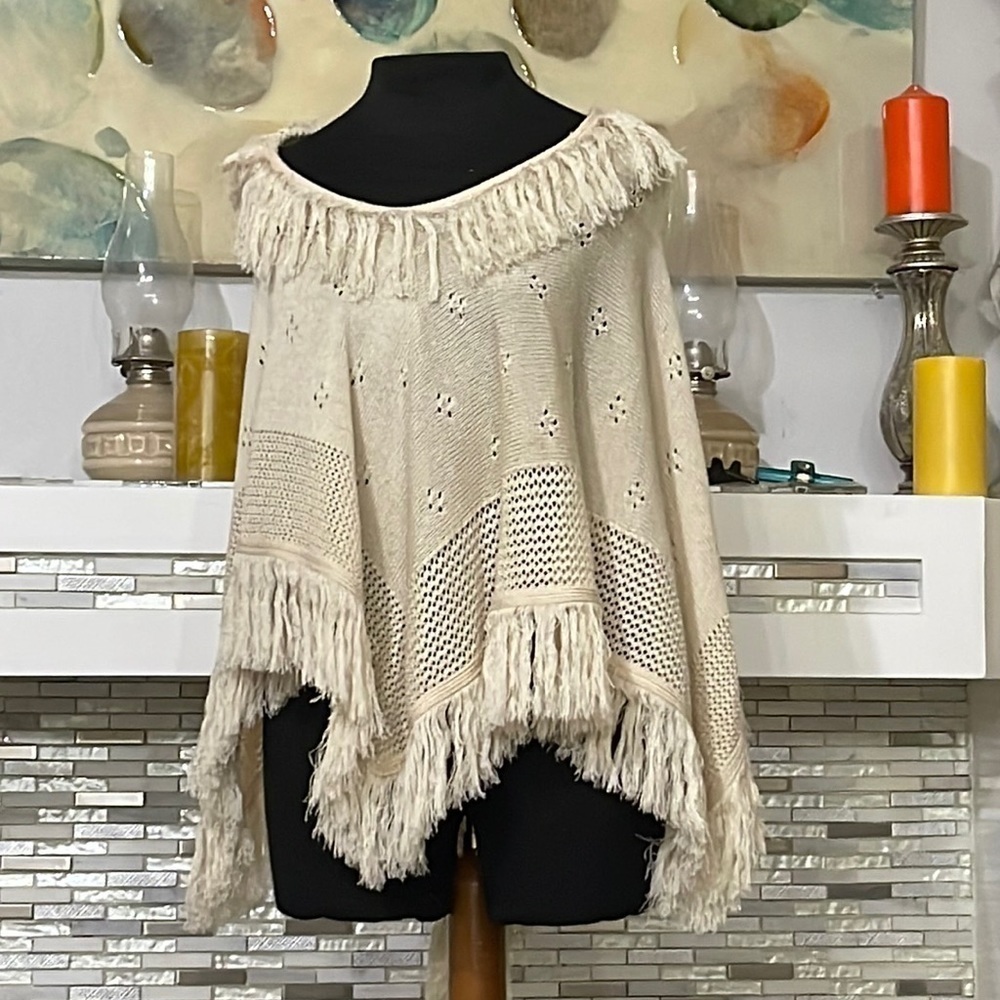 Offspring hooded fringe cape